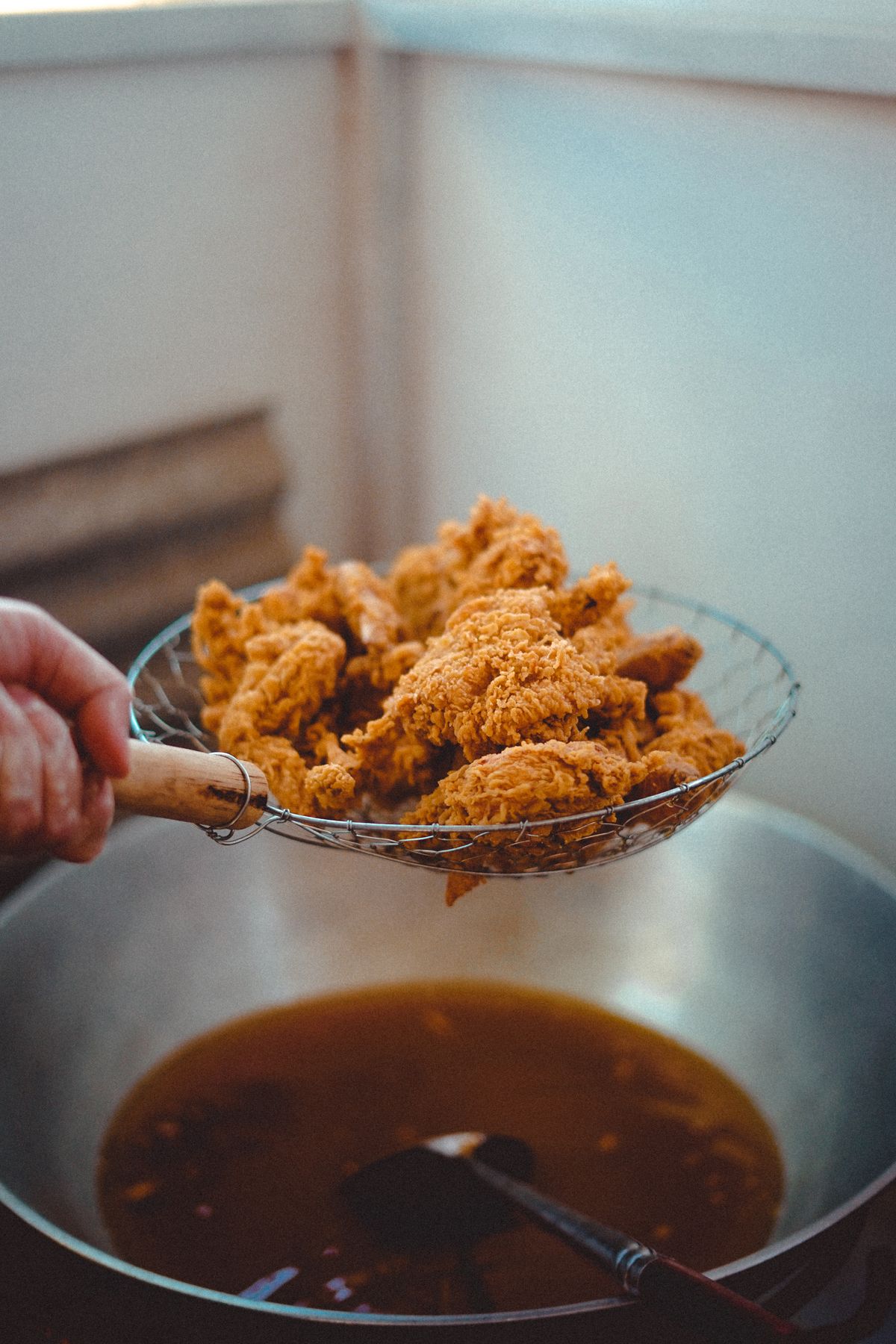 Compact mini air fryer on a small apartment kitchen counter