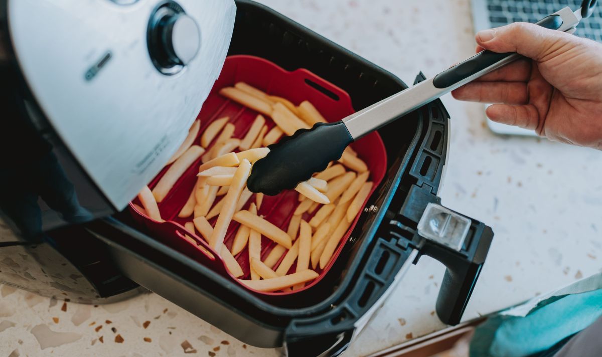 Crispy food cooked in a basket air fryer