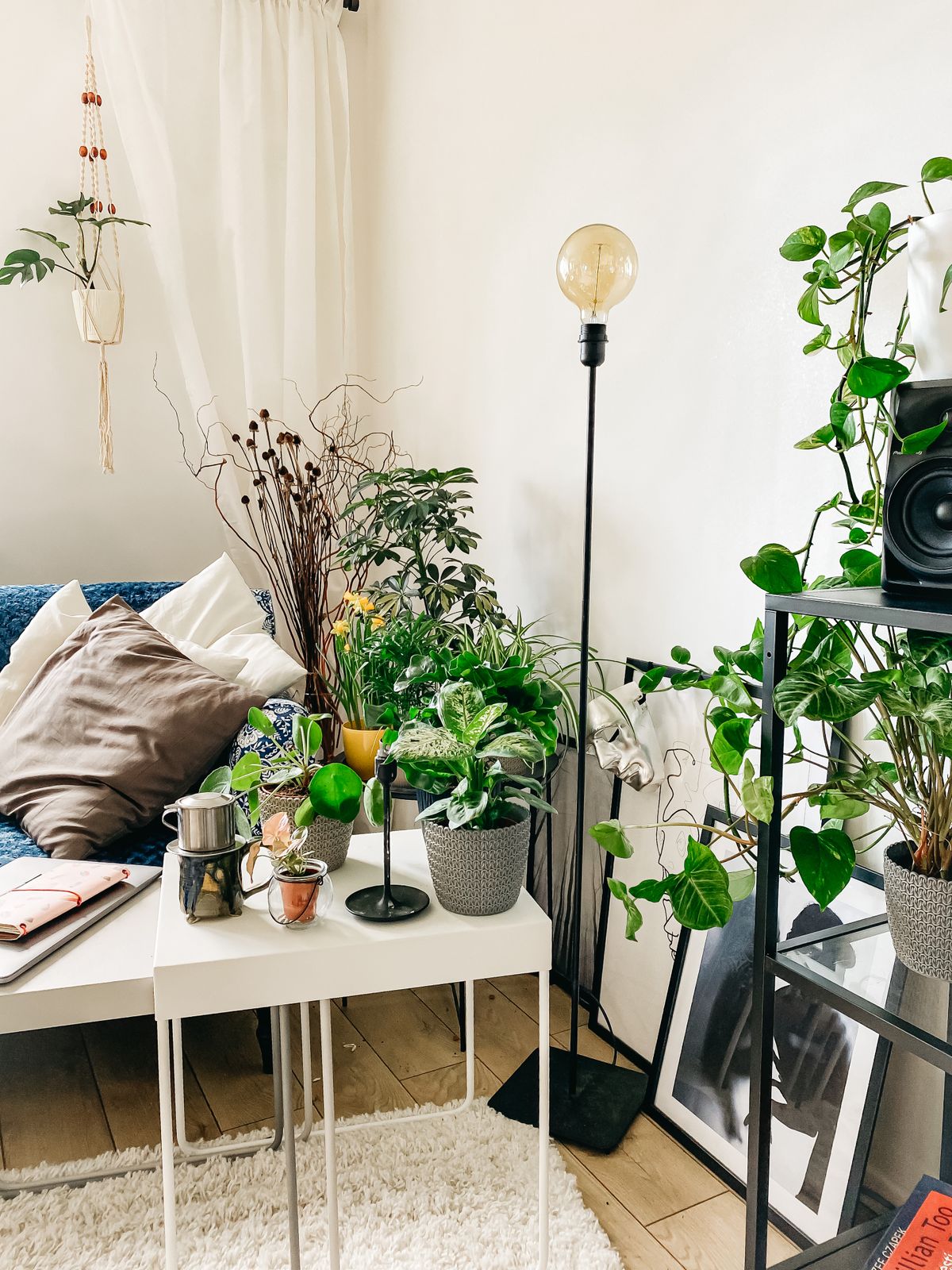Air purifier quietly running beside a bed at night