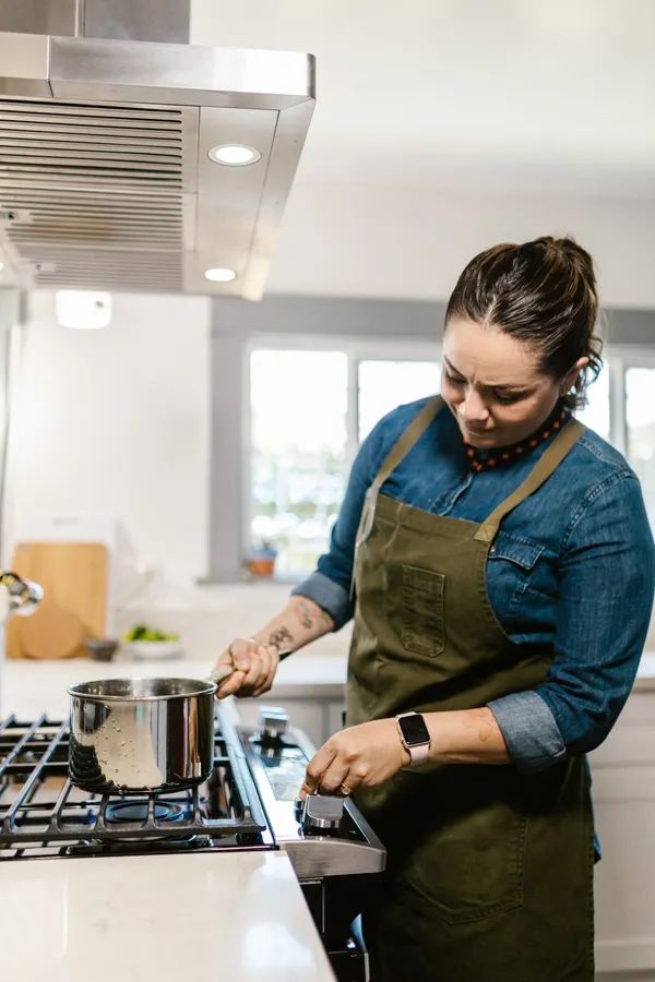 Bella 6 quart slim air fryer drawer open on a small counter