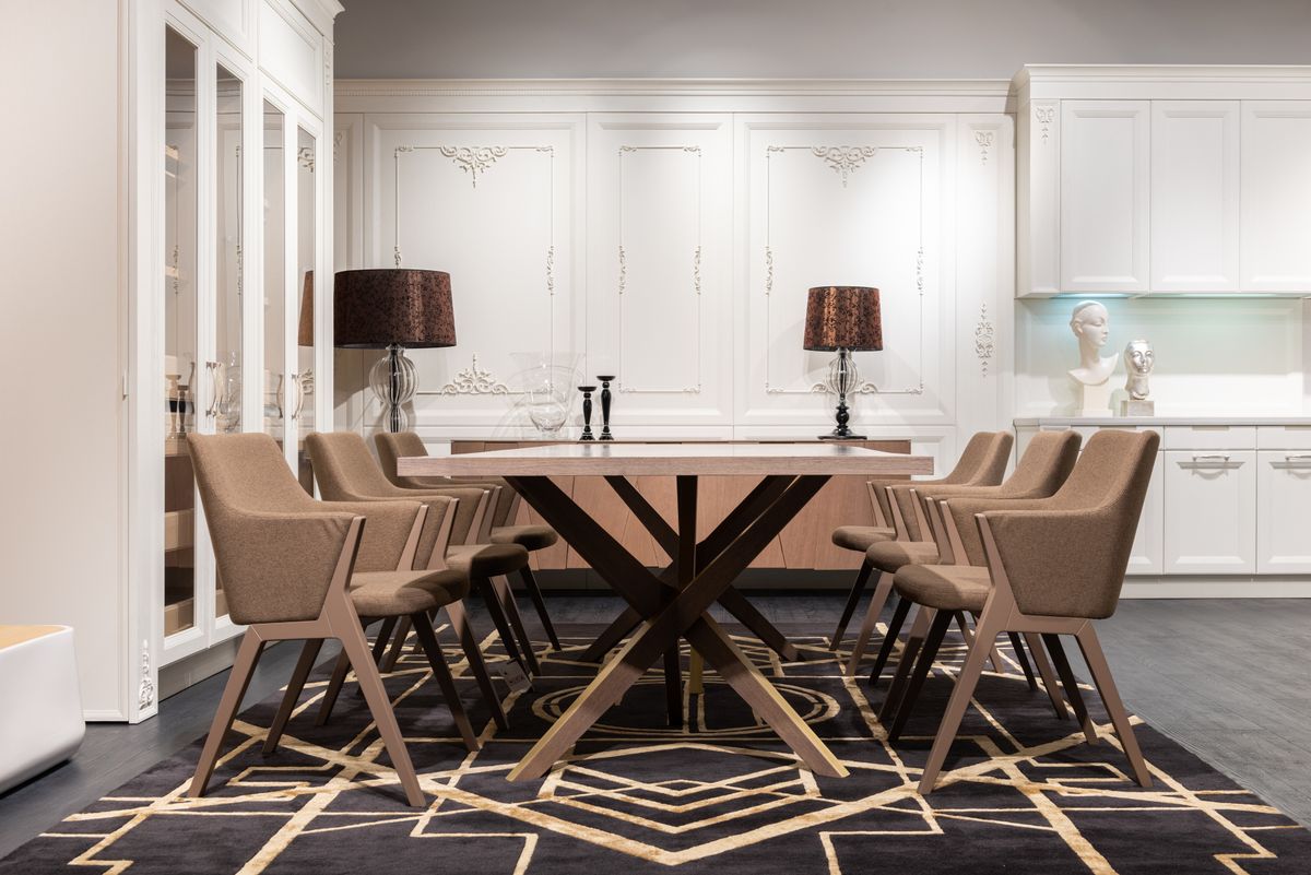 Modern dining room with a rectangular table and proper chair clearance