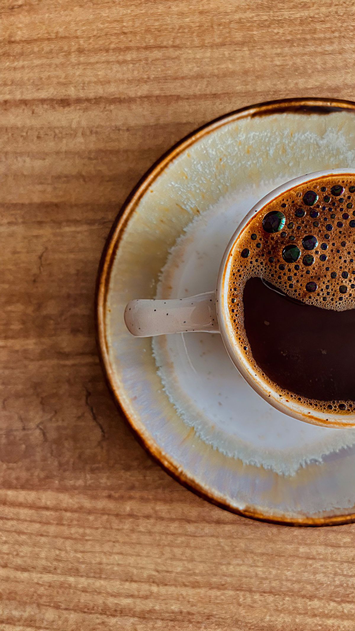 Single-serve coffee maker brewing a fresh cup in a morning kitchen