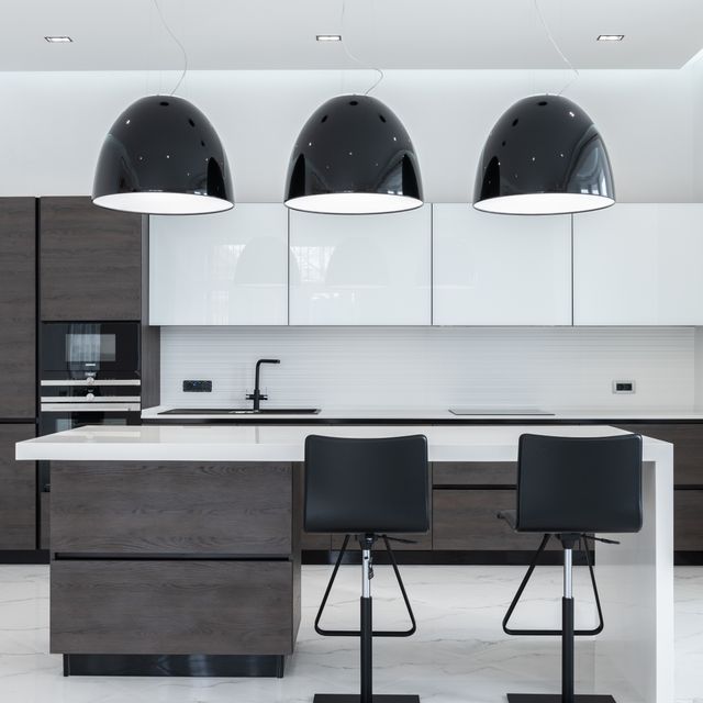 Pendant lights hanging over a kitchen island