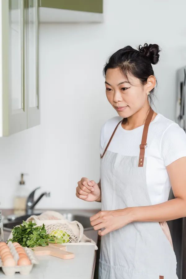 Midea Neo 21.1QT Combo Air Fryer Toaster Oven — cooking a meal in a modern kitchen