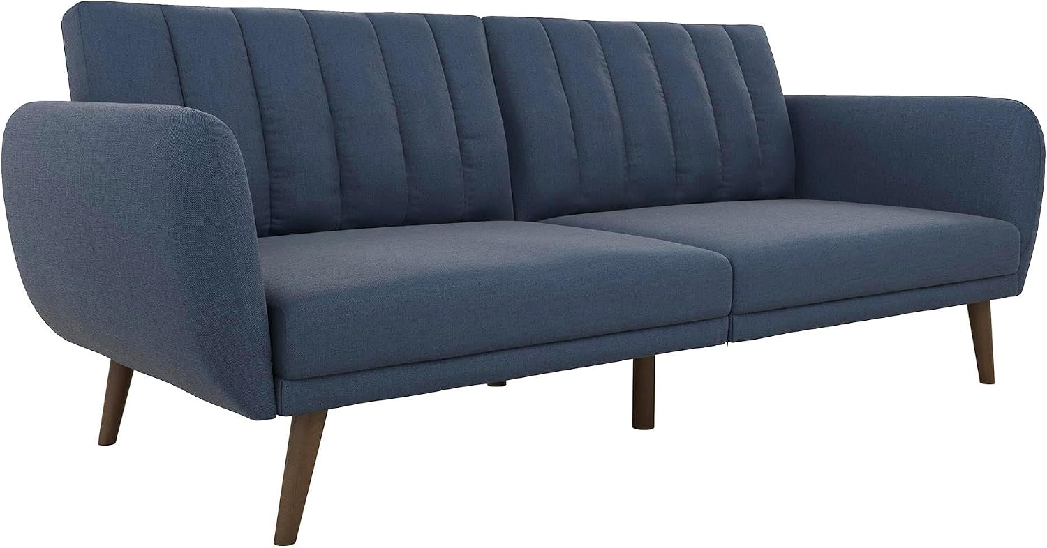 Novogratz Brittany futon sofa bed in blue linen with ribbed tufted back and wooden tapered legs