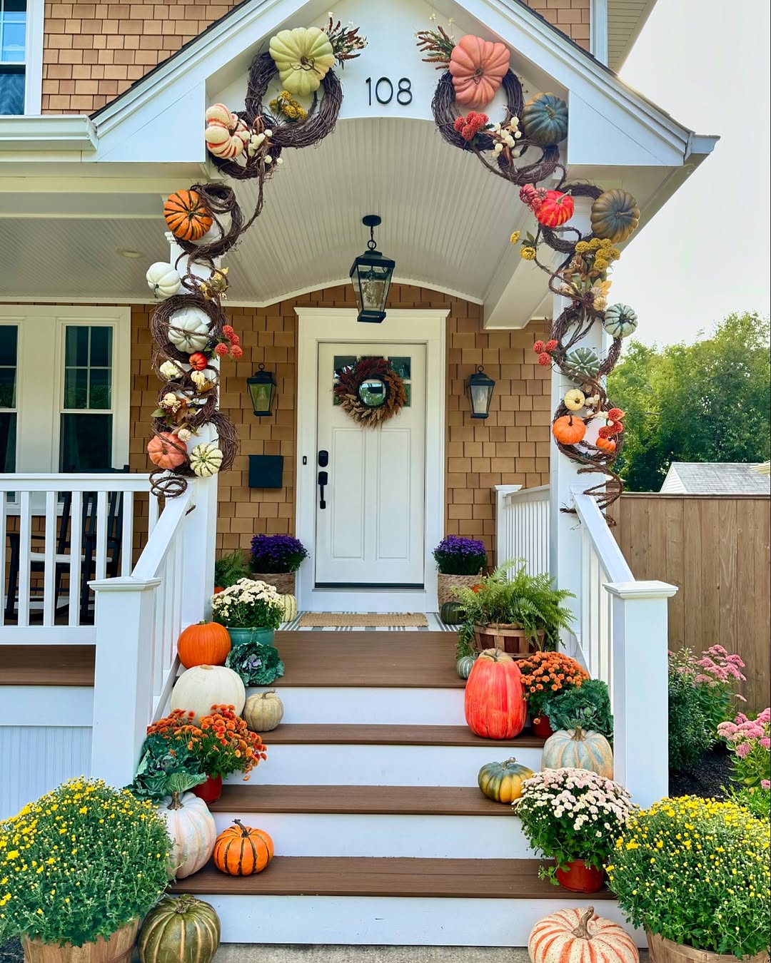 Pumpkin garland on a front porch