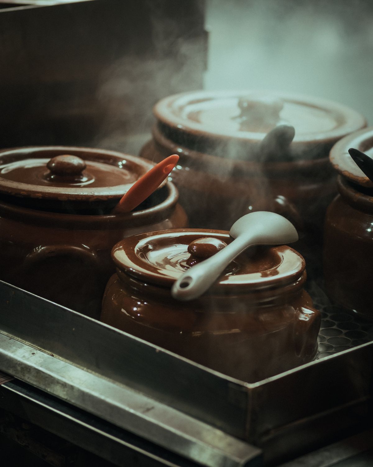 Sous vide precision cooker in a pot of water cooking steak