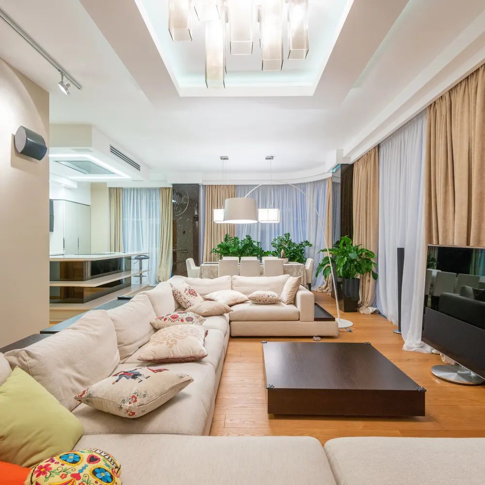 What Size TV Should I Get for My Living Room? — a bright family living room