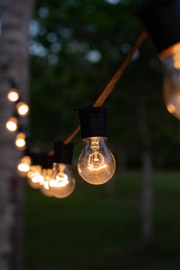 Which Outdoor Halloween Lights Should I Buy? A 2026 — patio lights glowing at night