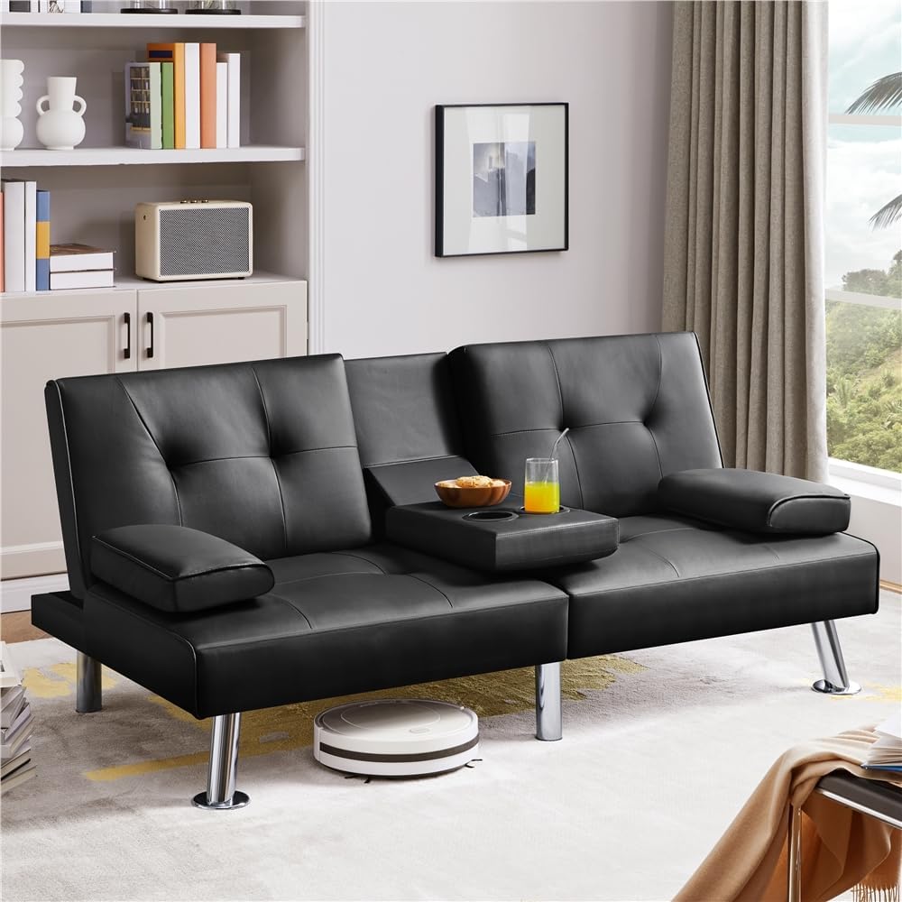 Yaheetech convertible sofa bed in black in a living room with the cup holder console folded down